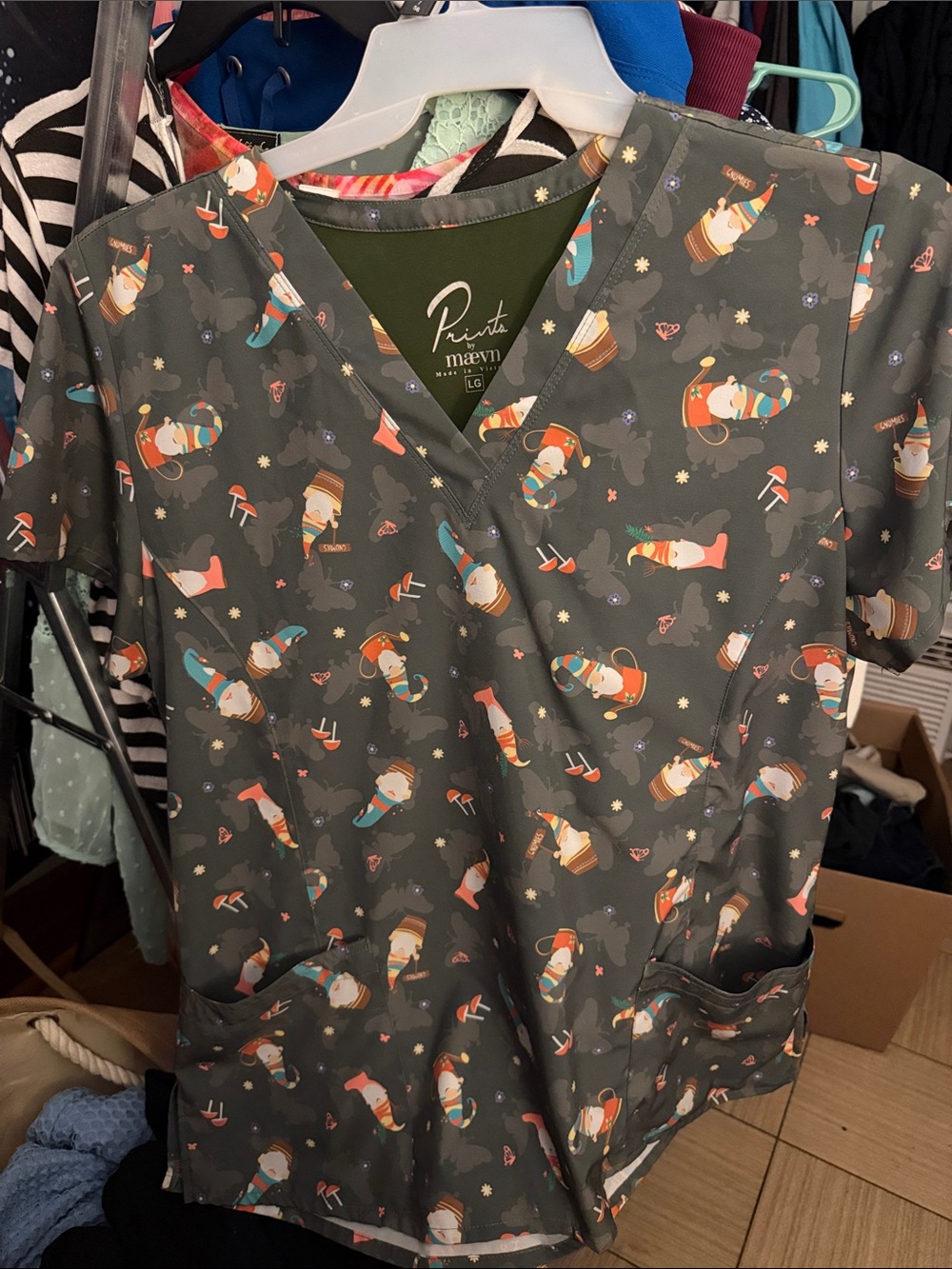 Women’s scrub top dark green butterfly fainted background with garden gnomes LG